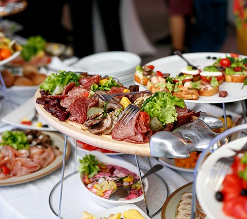 A table full of charcuterie boards and bruschetta